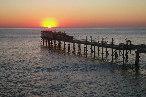 Sunset over the Swakopmund jetty in Namibia