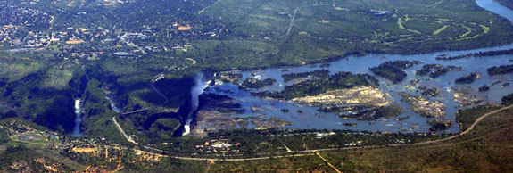 The mighty Zambezi river plunges over Victoria Falls into the deep gorges  that divide Zambia and Zimbabwe 