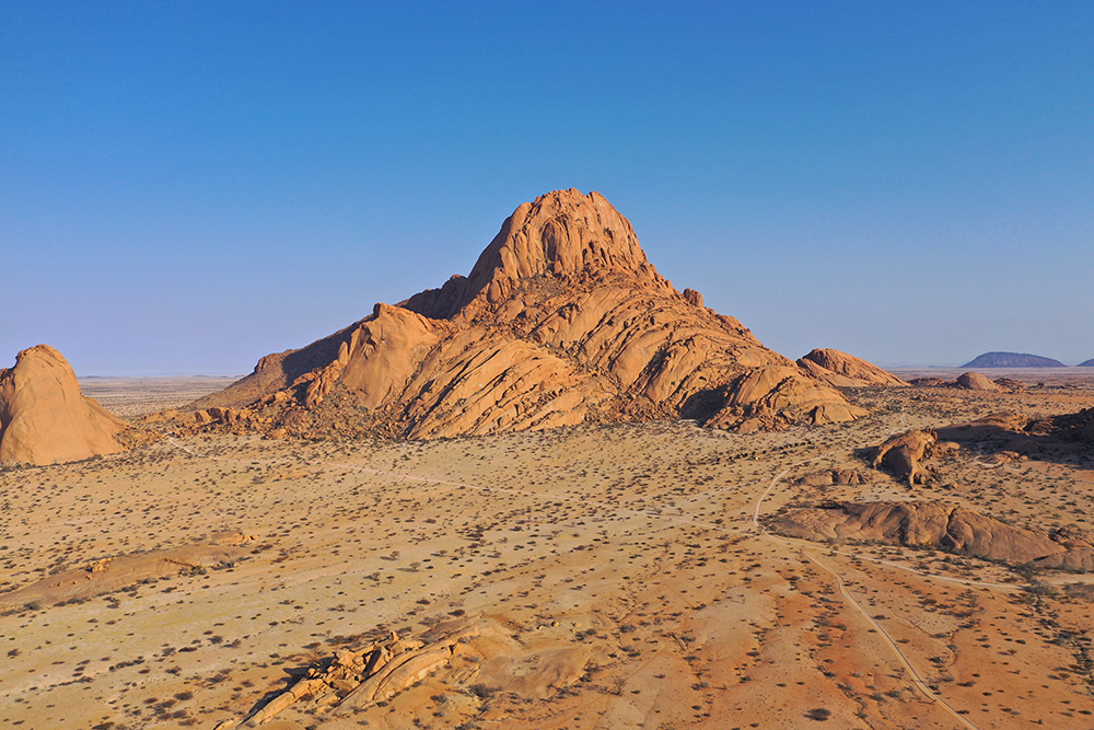 Spitzkoppe granite peaks glowing orange at sunrise, a signature Damaraland photograph