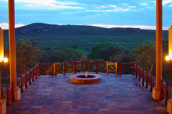Scenic balcony at Epacha Game Lodge, Aus, Namibia, offering an expansive view of the surrounding landscape and horizon, ideal for relaxation and enjoying the natural beauty of the Epacha Private Game Reserve.