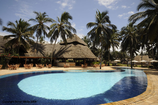 Relax beside the pool or on the beach at Bluebay beach hotel Zanzibar